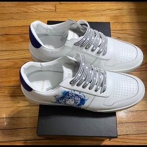 White Versace sneaker with a touch of blue..100% authentic and true to size